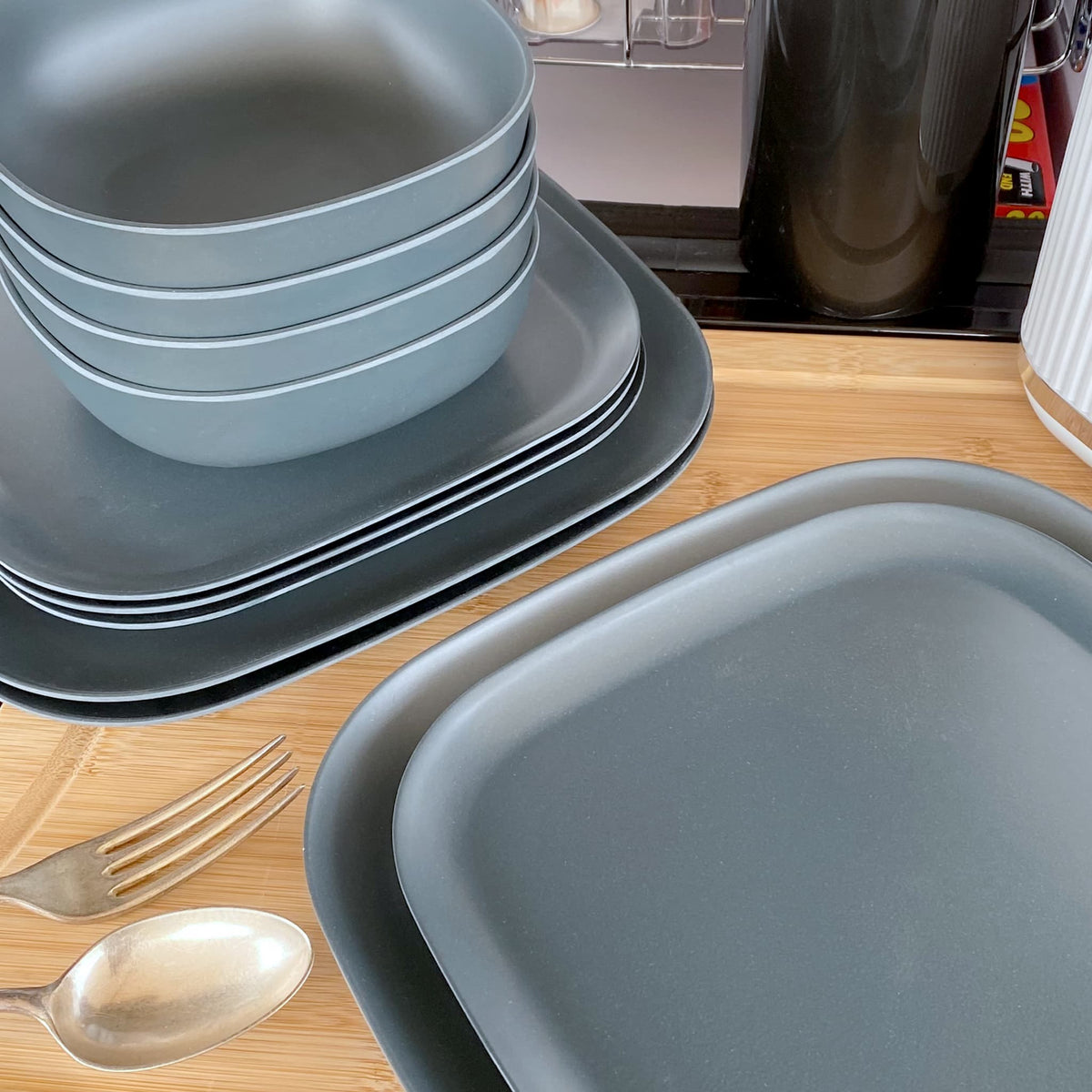 bamboo bowls plates 22cm and 26cm, sets of 4, in midnight grey, stacked and flat