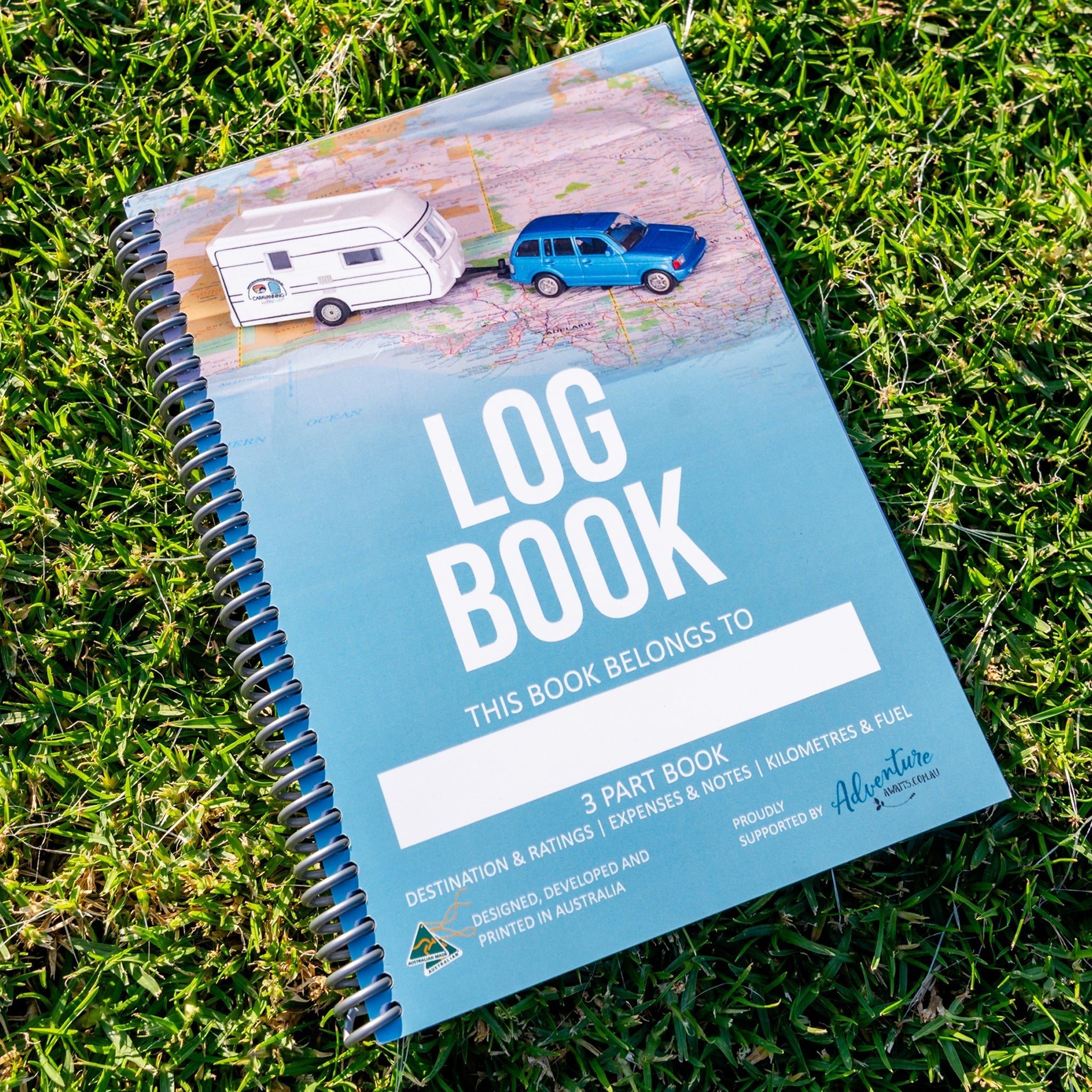 Caravan Camper Log Book, Australian Made camping travel Log Book front cover on grass