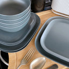 4 piece bamboo cereal bowl set, 22cm plate set and 26cm plate set in midnight grey, stacked and flat
