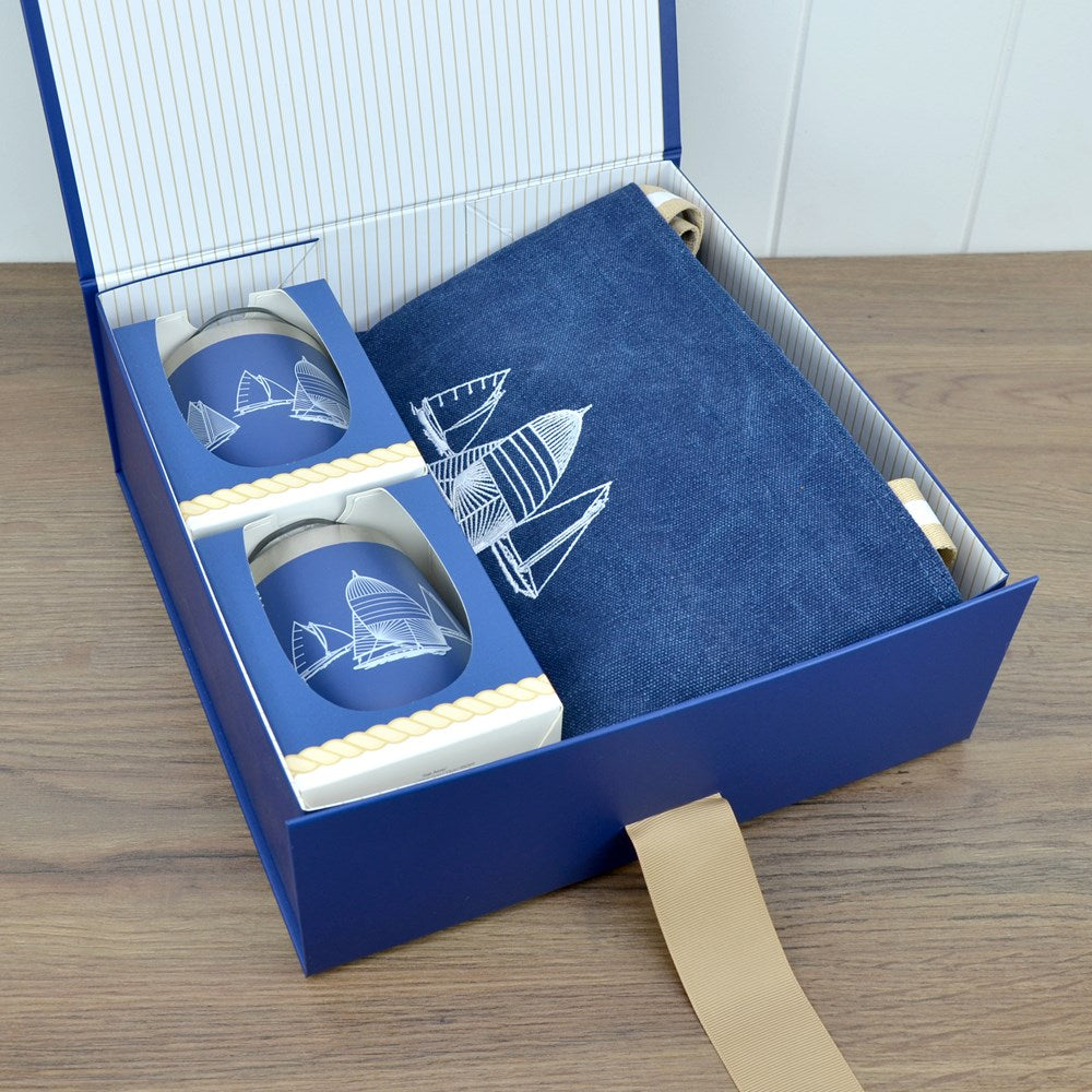 Van Go Collections 2 NautiGo Insulated Wine Cups and a Beach Bag in a blue gift box with striped lining and grosgrain ribbon.