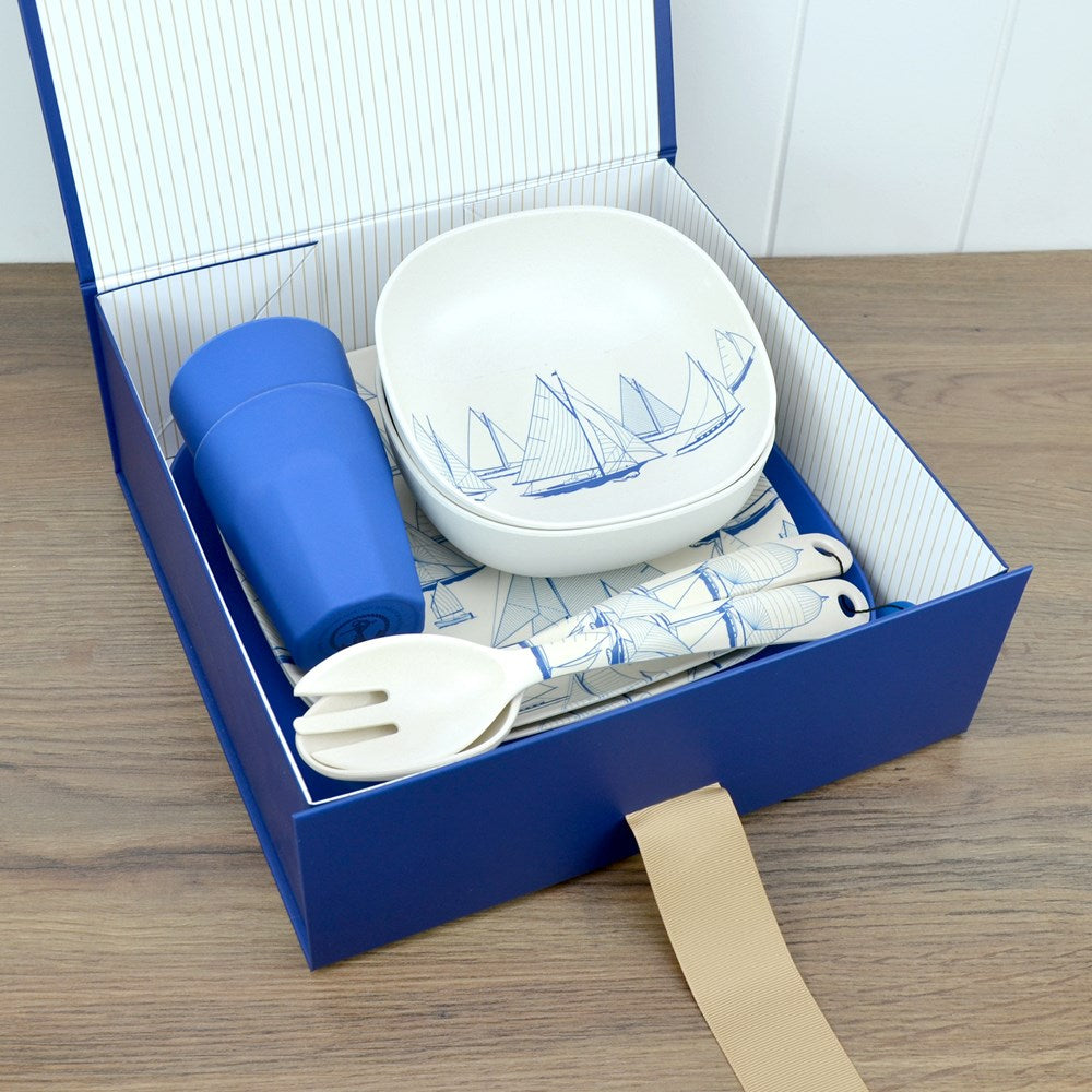 Van Go Collections 2 NautiGo 22cm Plates and Cereal Bowls with 2 26cm sea blue plates and latte cups plus Salad Servers in a blue gift box with striped lining and grosgrain ribbon.