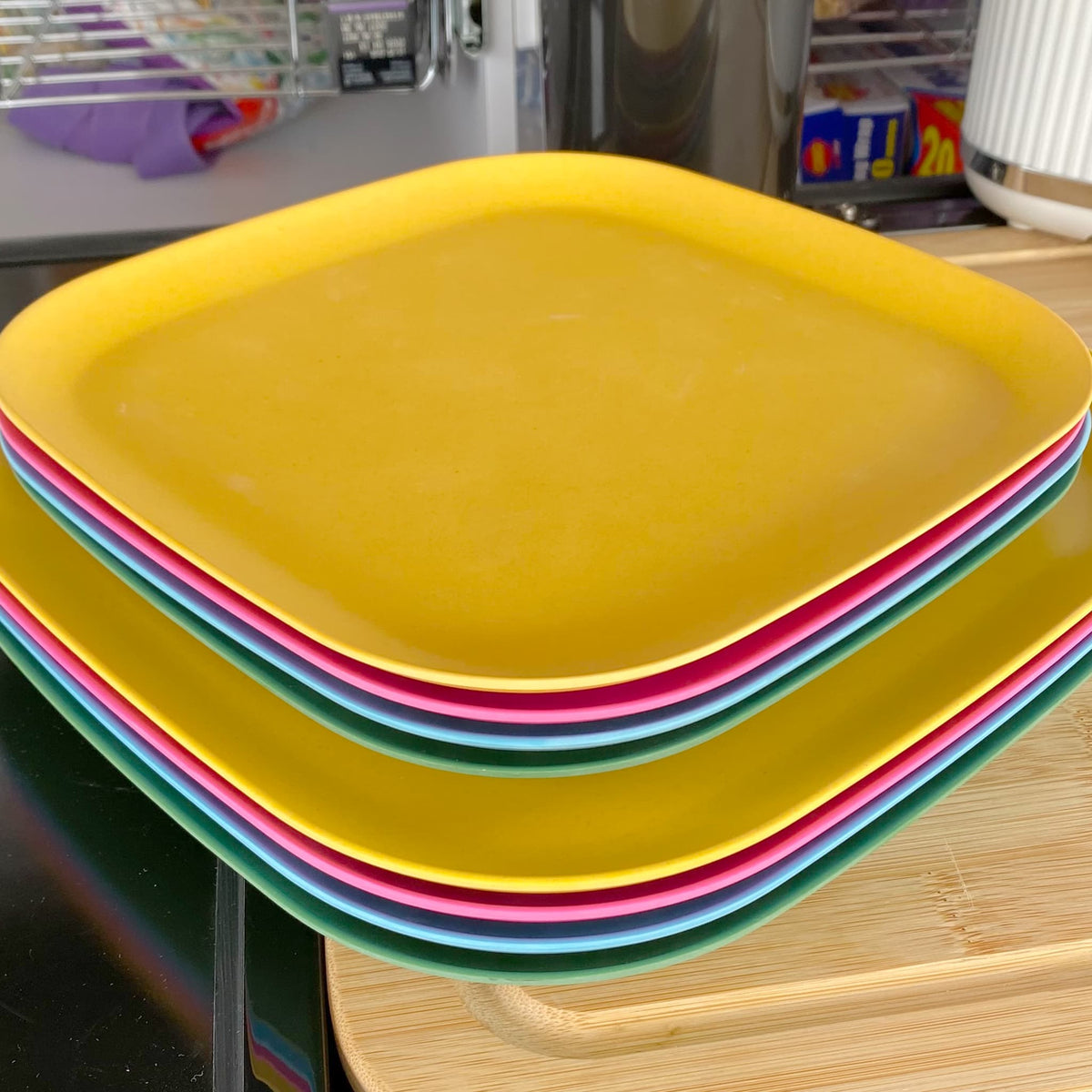 4 piece bamboo 22cm and 26cm plate sets, open road mix in sunshine yellow, classic green, vintage pink and pale blue, stacked