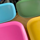 4 piece bamboo plate set 26cm, open road mix in classic green, vintage pink, pale blue and sunshine yellow, on timber board
