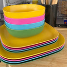 4 piece bamboo cereal bowl and plate sets, open road mix in sunshine yellow, classic green, vintage pink, pale blue, stacked