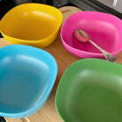 4 piece bamboo cereal bowl set, coastal mix in classic green, vintage pink, pale blue and sunshine yellow, with spoon