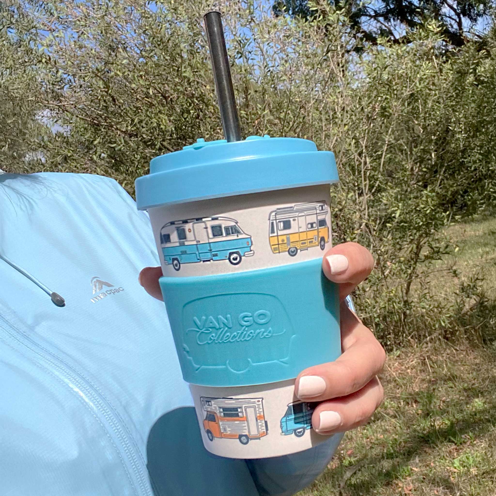 Van Go Bamboo Travel Mug 400ml, BPA free pale blue camper reusable keep cup with spill proof lid in hand in bushland