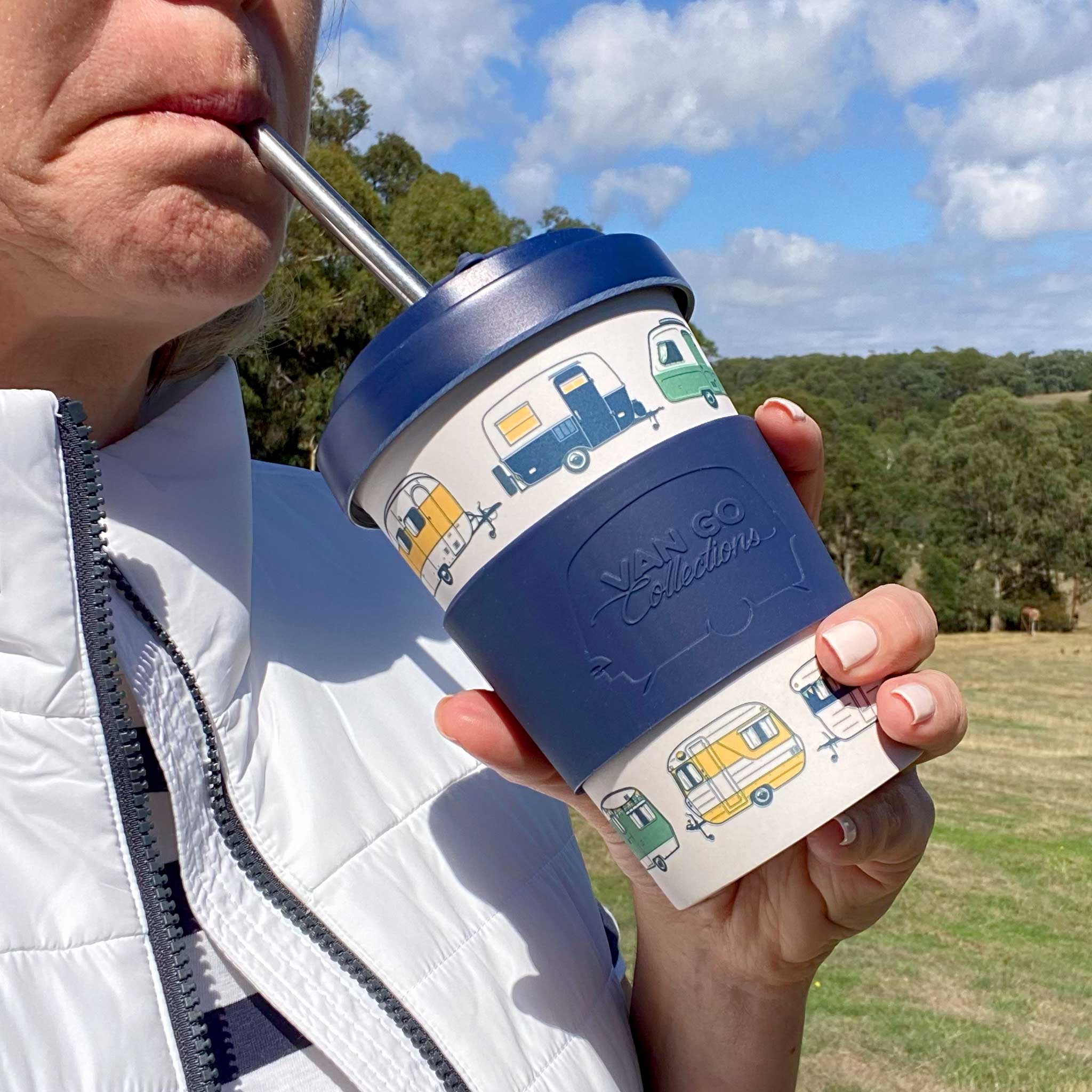 Van Go Bamboo Travel Mug 400ml, iconic caravan design navy blue BPA free reusable keep cup, drinking from straw in lid