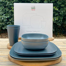 Van Go Caravan and camping 8 piece bamboo dinnerware set in midnight grey with camping plates, bowl, tumbler and gift box