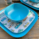 Van Go Camper 8 piece bamboo dinnerware set - closeup of motorhome plate with pale blue camping bowl and large plate