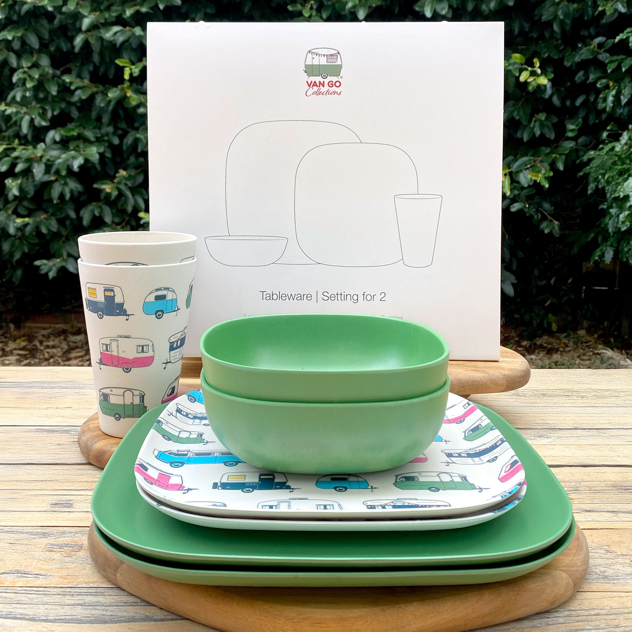 Van Go Caravan and camping 8 piece bamboo dinnerware set Iconic van living plate and caravan tumbler plus classic green camping bowl and large plate on timber table with gift box