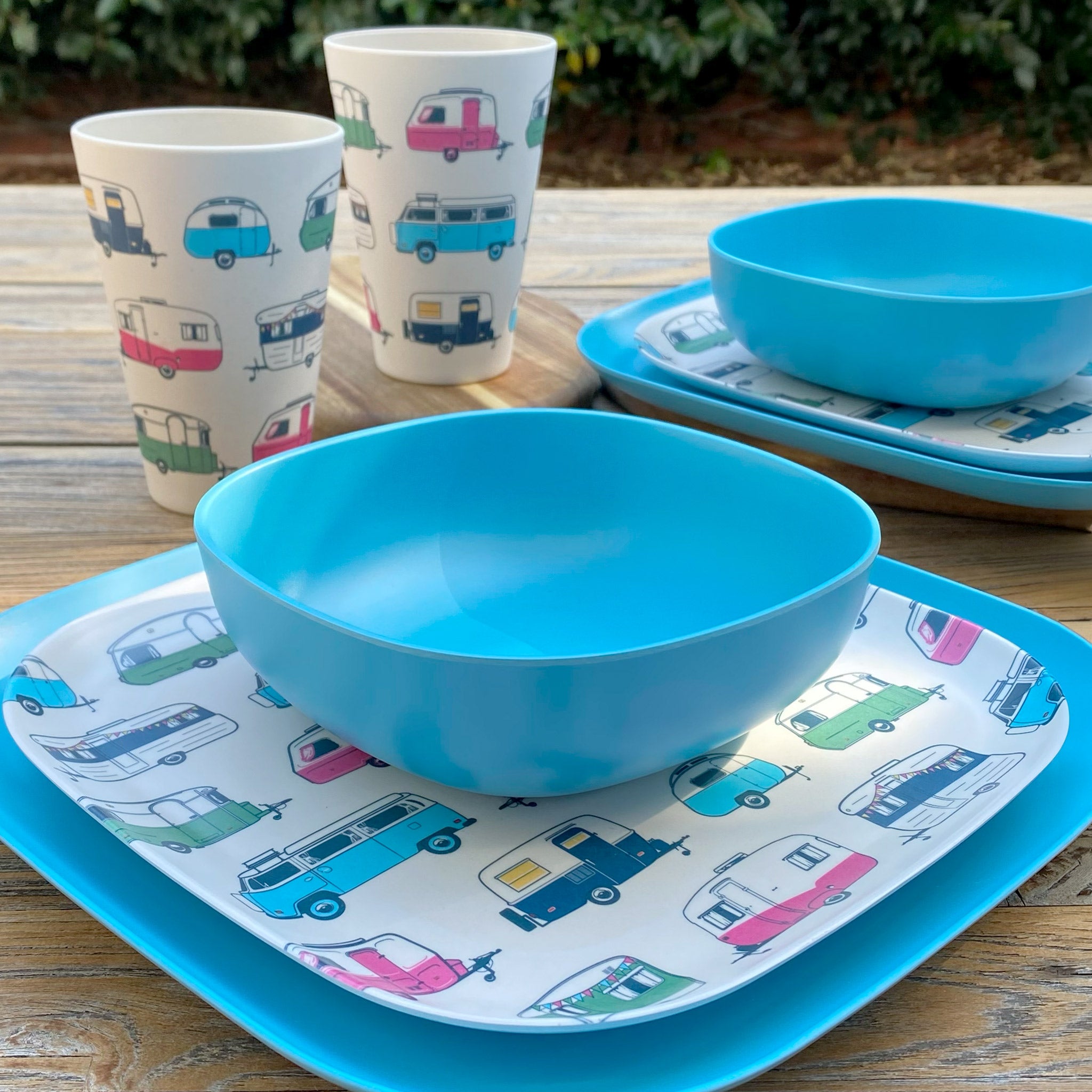 Van Go Caravan and camping 8 piece bamboo dinnerware set Iconic van living plate and caravan tumbler plus pale blue camping bowl on timber table